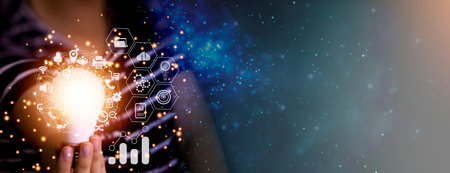 hand holding a light bulb icon Creativity and innovation are the keys to success. New ideas and...