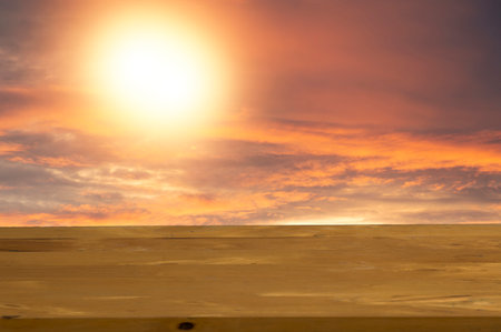 light brown wooden floor orange sky backgroundの写真素材
