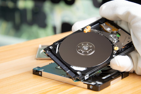 2.5-inch hard disk drive is the part that is used to store data or is called a hard disk as well.の写真素材