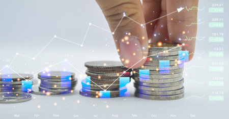 Successful business concept, hand stacking coins pushingの写真素材