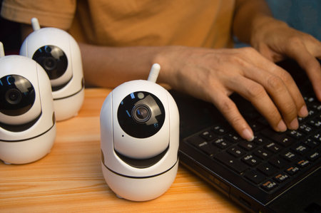 IP camera operator From the computer, set up the IP camera.の写真素材