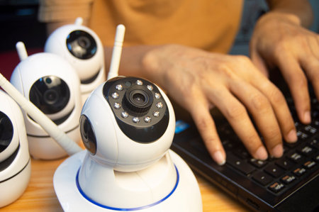 IP camera operator From the computer, set up the IP camera.の写真素材