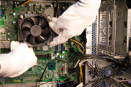 top view mechanic repairing computerの写真素材