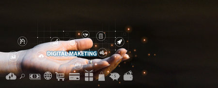 Hand showing signs and icons of digital marketing, internet advertising and business technology concept, online marketing, e-commerce online.の写真素材