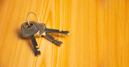 The key is on the wooden floor.の写真素材
