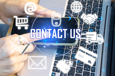 Contact us or our customer support hotline where people connect. and touch the contact icon on the virtual screenの写真素材