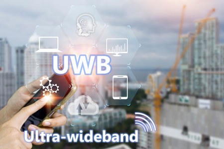 Ultra-wideband UWB is a short-range radio communication technology on bandwidths of 500MHz or greater and at very high frequencies. Overall, it works similarly to Wi-Fi(not a trademark)の写真素材