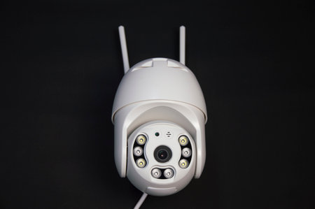 White IP camera over a black backgroundの写真素材