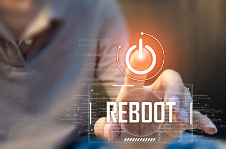 The concept of upgrading or rebooting the system. The businessman clicks on the refresh icon.の写真素材