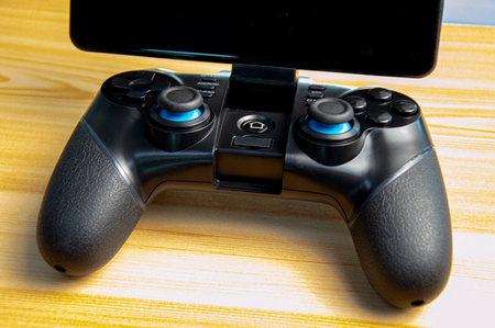 front view of joystick placed on wooden floor