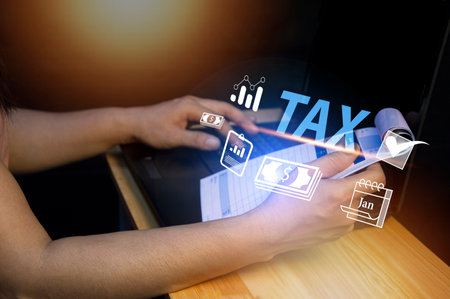 Tax deduction planning concept. Businessman calculating business balance prepare tax reductionの写真素材
