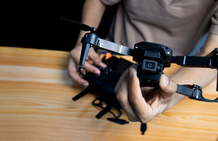 Close up of a blured man testing the drone.