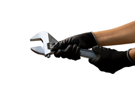 Mechanic holding a large adjustable wrench Size 375mm, white backgroundの写真素材