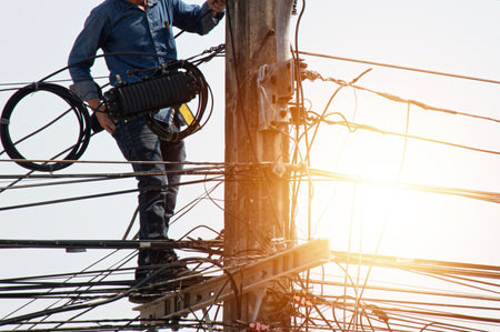 High voltage tower work for installing wires and equipment