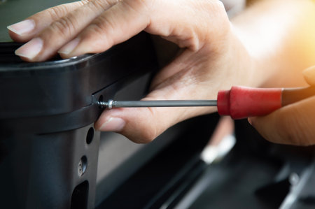 Screwdriver tightens the screws. repair tools Mechanic or engineer toolsの写真素材