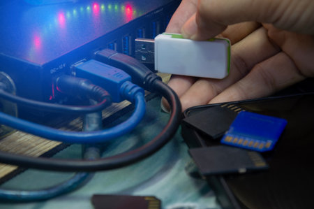 Using a flash drive, connecting to a computer via USB port.