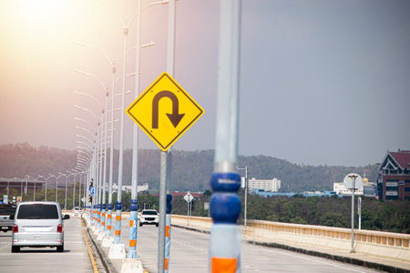 Sign showing the U-turn lane in front