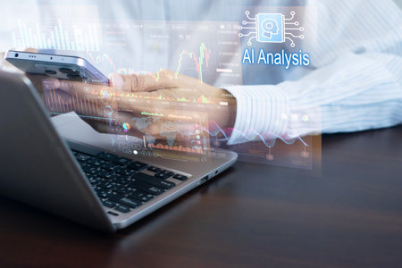 An analyst uses a computer and dashboard for data business analysis and Data Management System,...