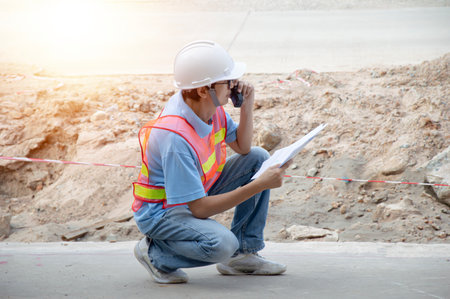 The concept of engineers is reviewing the design and controlling the construction work.