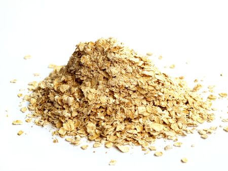 Pile of rolled oats isolated on white    の写真素材