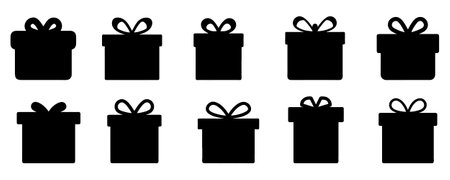A set of black gift box icon. Silhouette gift box vector illustration on white backgroundのイラスト素材