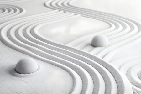 Japanese zen garden with white stones in the sand, closeupの写真素材