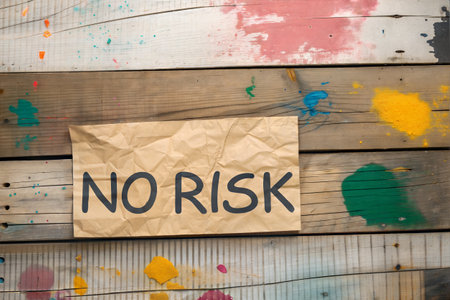 no risk written on a piece of paper on a wooden background.