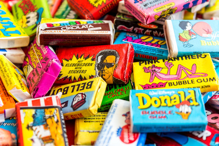 ASHDOD, ISRAEL - SEPTEMBER 27, 2015: Many various colorful chewing or bubble gum from seventies, eighties and nineties, including Robocop, Turbo, Donald Duck, BomBibom, TipiTip, X-Men, Dunkin, OtoMotoのeditorial素材