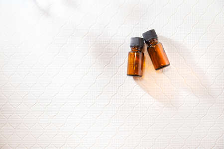 Aroma, two bottles of aromatic oil. Relaxation, beauty image.の写真素材