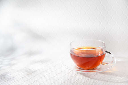 Decaffeinated rooibos tea in a clear glass.の写真素材