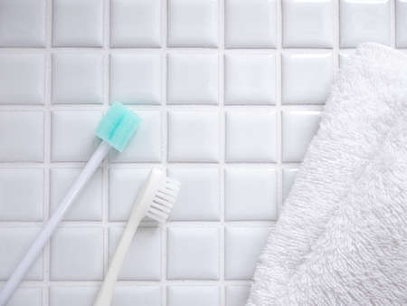 Brushing with a toothbrush. Tooth care and oral care. Toothbrushes and oral care sponge brushes.の写真素材