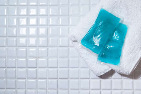 Two coolers,ice packs to cool food and body.の写真素材