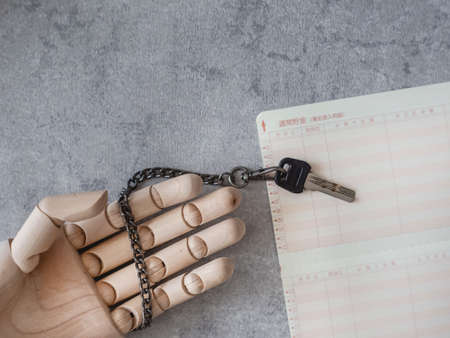 Freezing of passbooks, bank accounts and accounts. Security passwords and locks.の写真素材