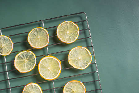 Dried lemon slices. Multiple dried cut lemons.