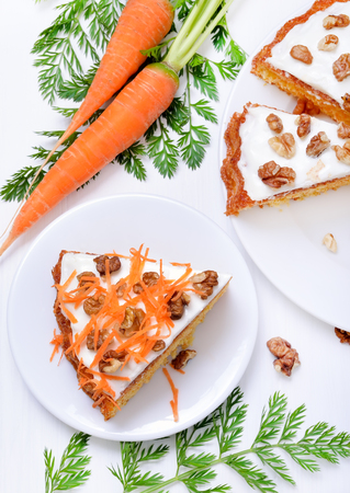 Piece of carrot cake on white plate, top viewの写真素材