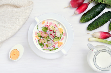 Appetizing vegetarian cold soup on white table. Okroshkaの写真素材