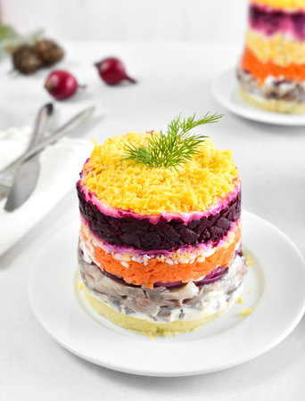Layered salad with beet, herring, carrots and potatoes. Traditional Russian Shuba saladの写真素材