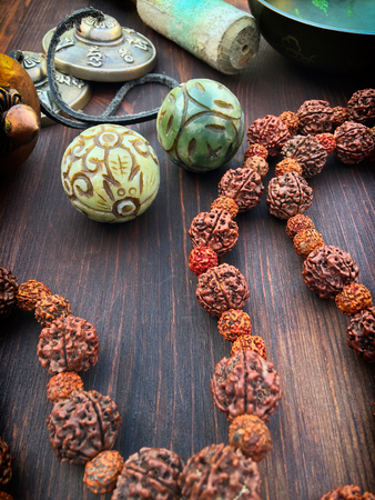 Rosary from the dried fruit of the tree rudraksha and articles for meditationの写真素材