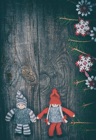 Christmas wooden background with Christmas toys and decorations, vintage toningの写真素材