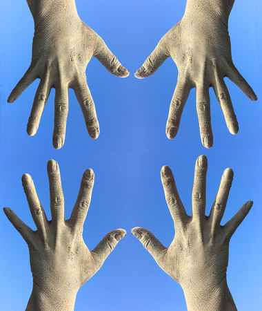 Human dirty hands toward each other, a blue background
