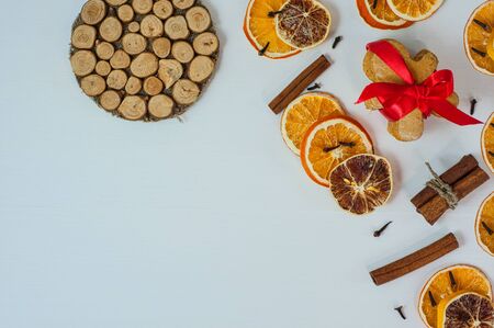 white wooden festive background with slices of dried fruits and gingerbread, the empty spaceの写真素材