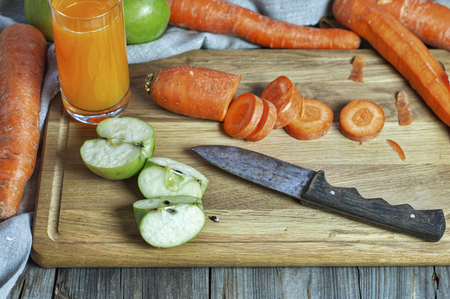 Carrot and apple juice at home, top viewの写真素材