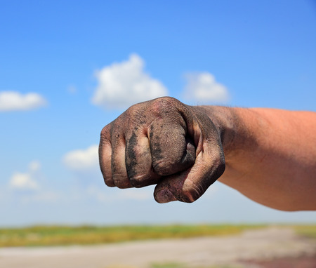 The man's hand is fisted, close upの写真素材