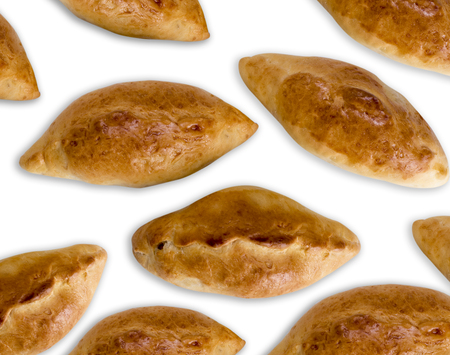 homemade baked patties with filling on an isolated white background, top viewの写真素材