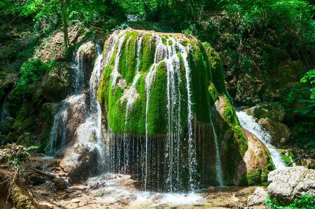 Waterfall Silver streams in Crimea Ukraine, summer day