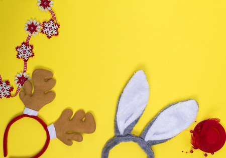 carnival headdresses on a yellow background, empty space at the topの写真素材