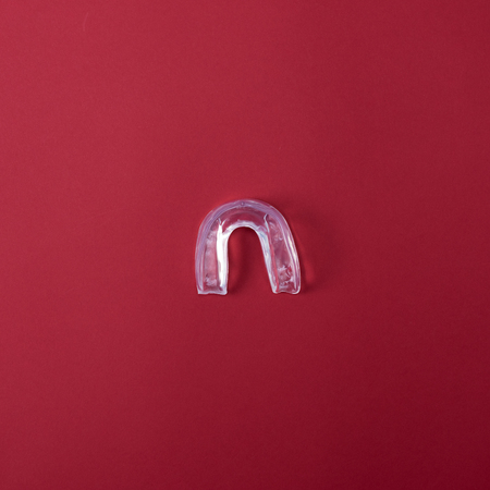 white silicone cap for teeth, protective object for athletesの写真素材