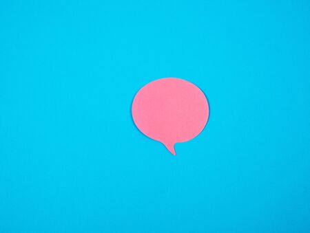 pink sticker in the shape of a cloud on a blue background, copy spaceの写真素材