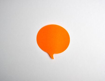 orange paper cloud sticker on white background, close up