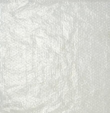 transparent packaging film with air bubbles for packaging of packages in transit, full frame
